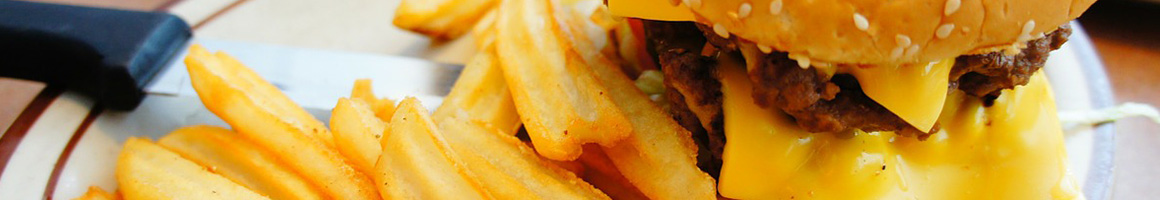 Eating Burger Pub Food at Woody's Pub & Grub restaurant in Ashland, MO.